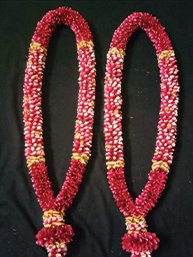 pink with red and golden garland